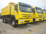 大きく黄色いダンプ トラック、6x4 ZZ3257N3847Aの採鉱で使用される堅いダンプカー トラック
