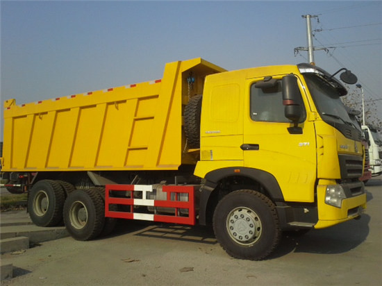 大きく黄色いダンプ トラック、6x4 ZZ3257N3847Aの採鉱で使用される堅いダンプカー トラック